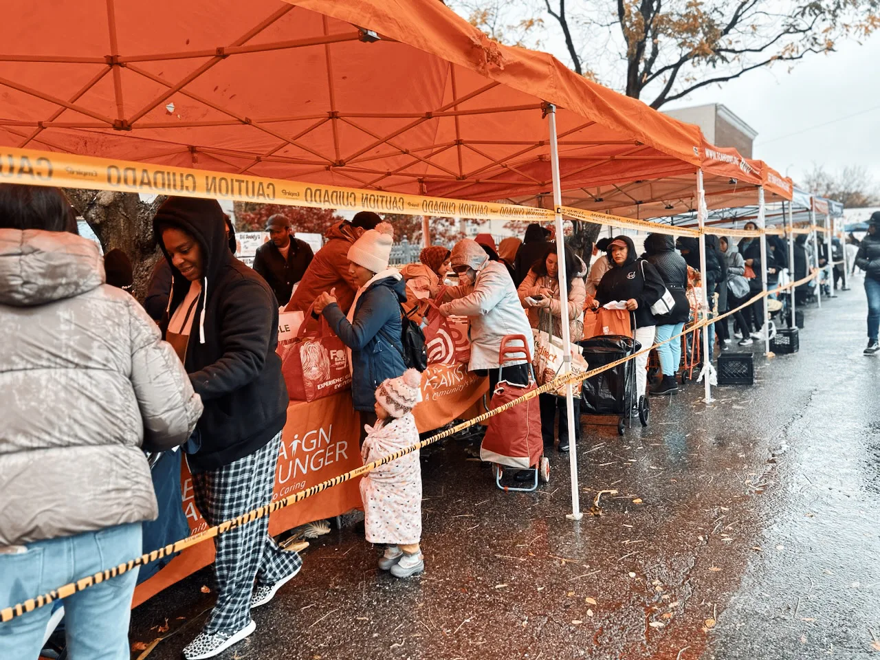 Food donation recipients in line